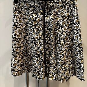 Adorable mini skirt, w/tights in winter or with tan legs in summer.